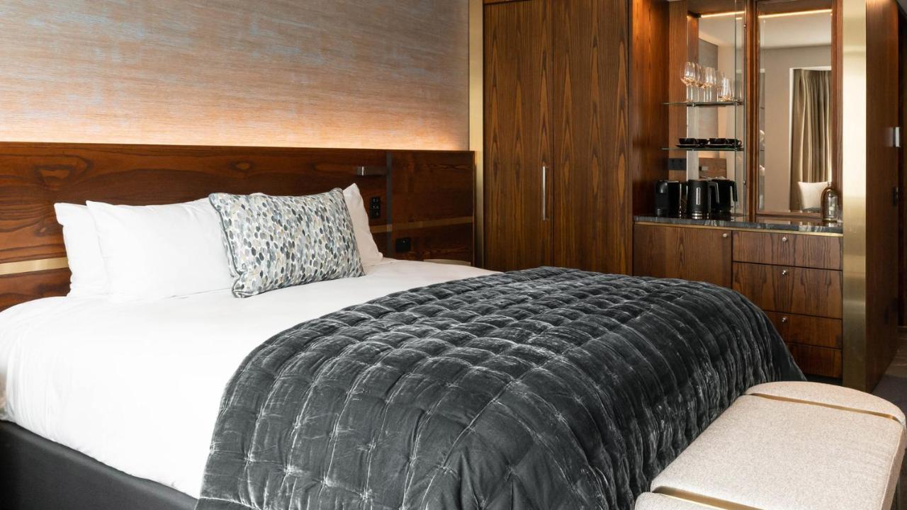 Horizon By Skycity Auckland Luaran gambar A bed with a throw